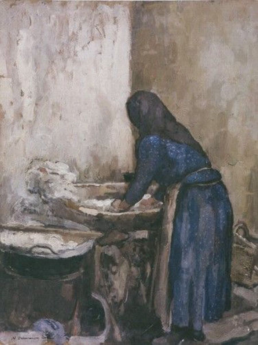 Femeie spălând rufe