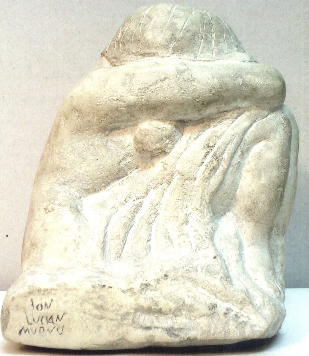 Femeie șezând