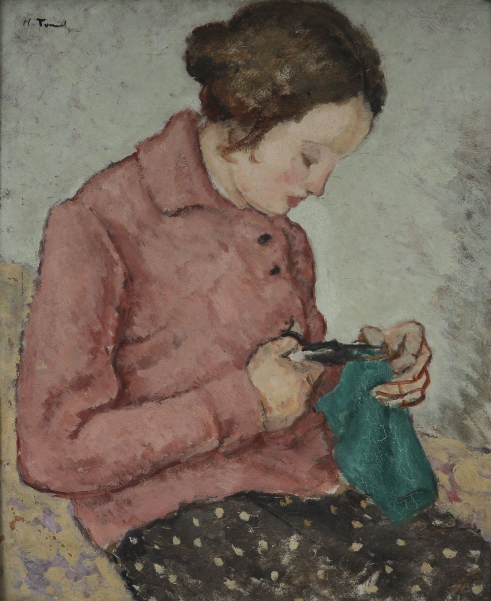 Femeie lucrând croitorie
