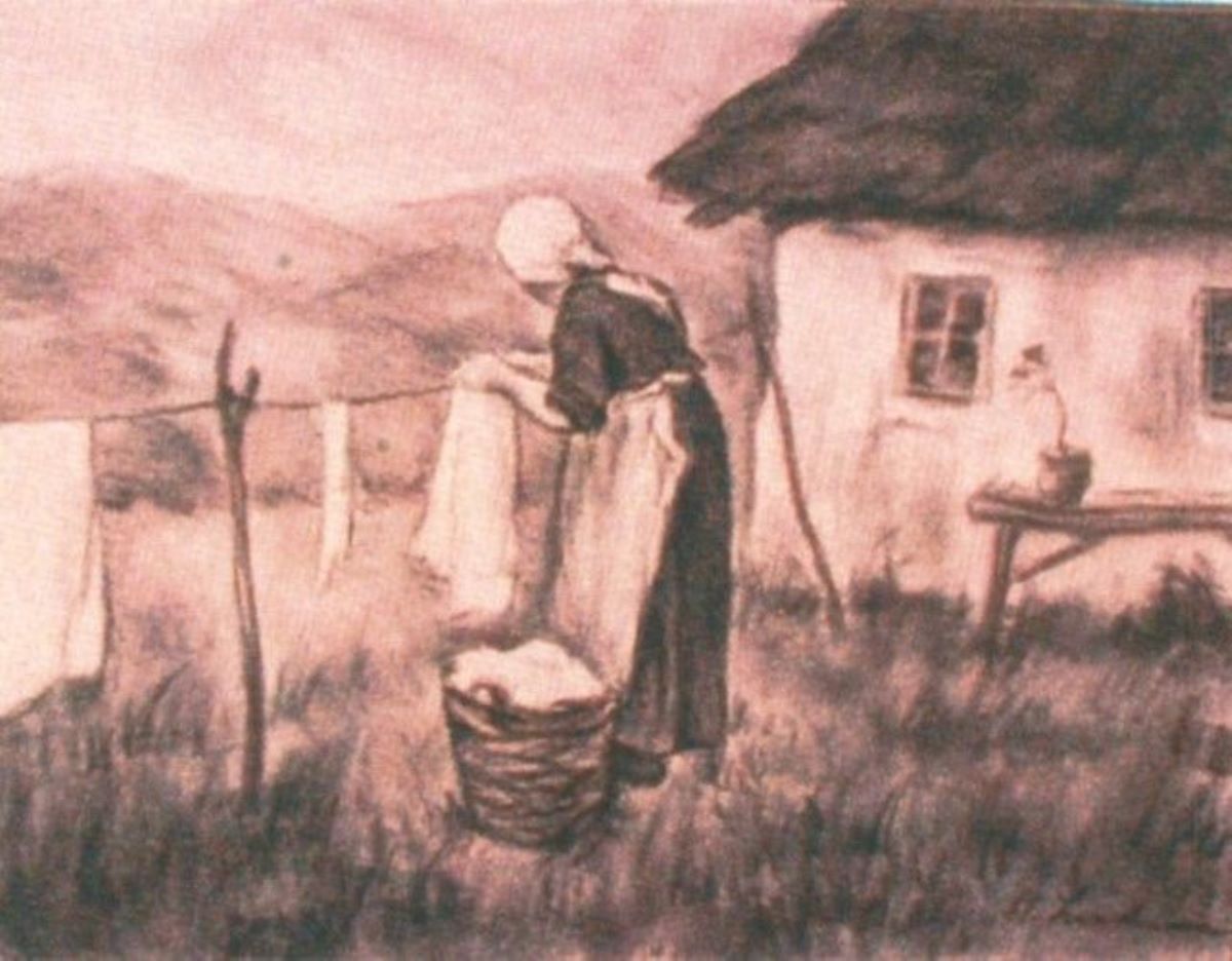 Femeie punând rufe la uscat