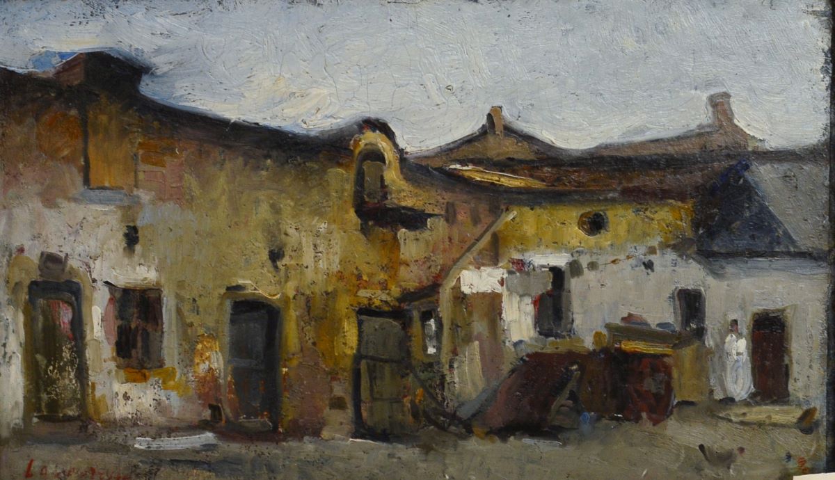 Curte de fermă înconjurată de clădiri