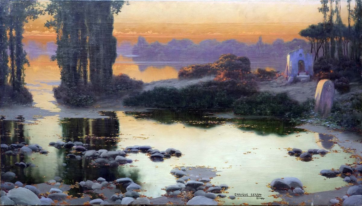 Apus de soare peste un lac cu meandre
