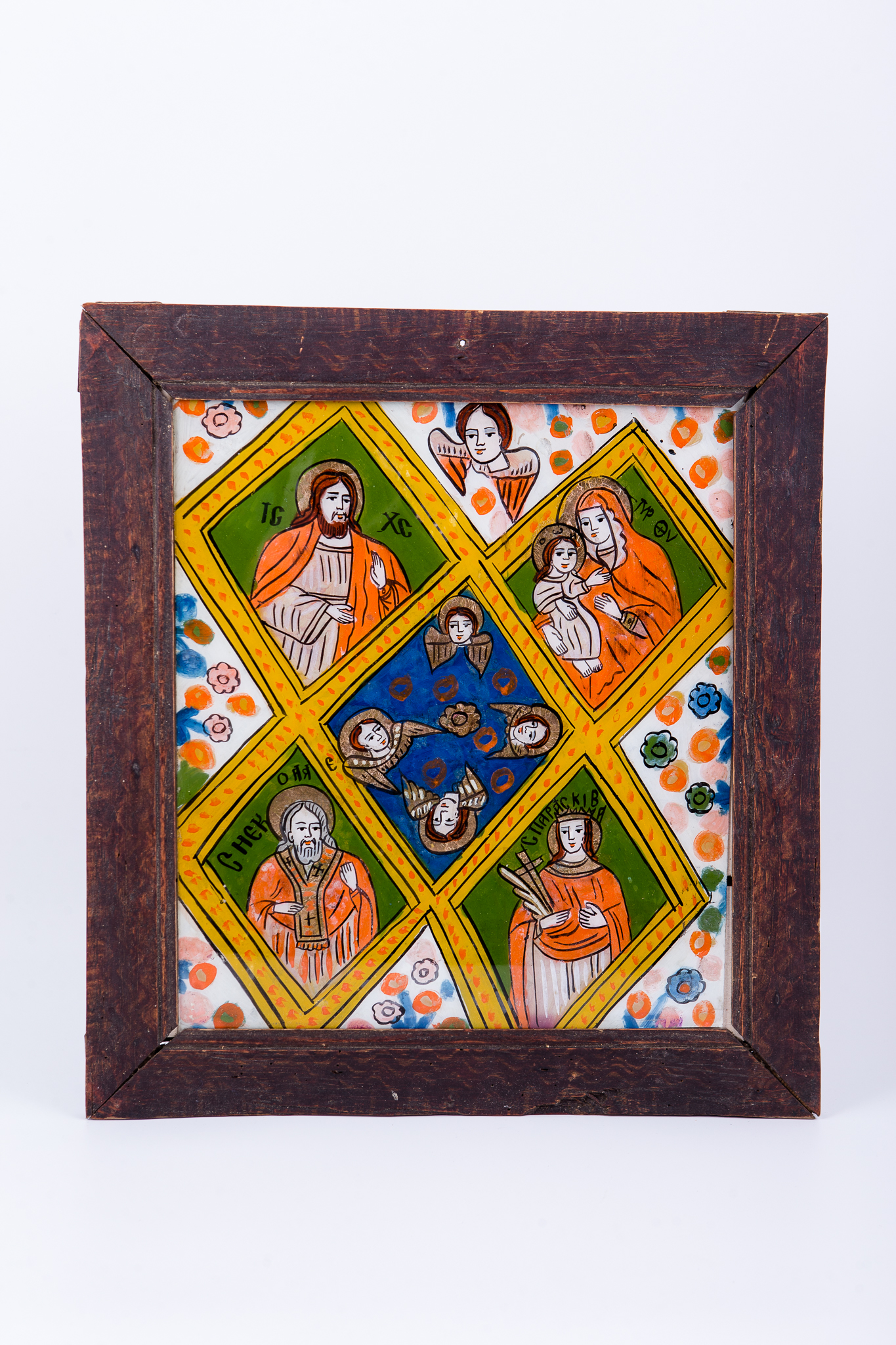 Masa Raiului este Sfânta Liturghie, săvârșită de Iisus Hristos Pantocrator - Dumnezeu-Tatăl, la care participă Maica Domnului cu Pruncul Iisus Hristos în brațe - Hodighitria, Sfântul Mare Ierarh Nicolae făcător-de-minuni și Sfânta Mare Cuvioasă Parascheva de la Iași. Este o imagine simbol, o sinteză a Împărăției Cerurilor și a Bisericii apostolice creștin-ortodoxe. Icoana este realizată prin compartimentarea, segmentarea compoziției cu brâuri decorative și chenare geometrizante, albastre bleu-ciel, cu micuțe pucte roșii. Masa Raiului este asemenea unei hărți a Împărăției Cerești. Cromatica este armonioasă: roșu vermillon, albastru bleu-ciel, galben, verde spanac-avocado, alb, negru. Întreaga icoană are o compoziție teologică deosebită. Inscripția din româno-chirilică se traduce ICXC MP Iisus Hristos Maica Domnului Sf Nicolae Sf Parascheva. Icoana este de Țara Oltului.